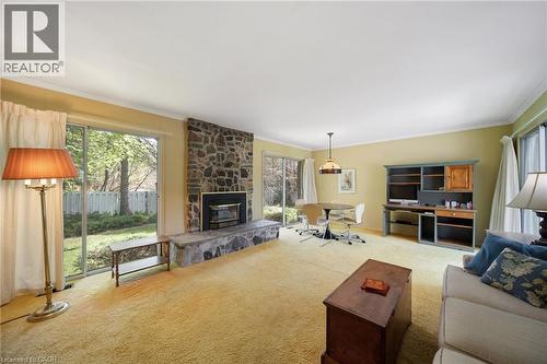 133 Mccall Crescent, Simcoe, ON - Indoor Photo Showing Living Room With Fireplace