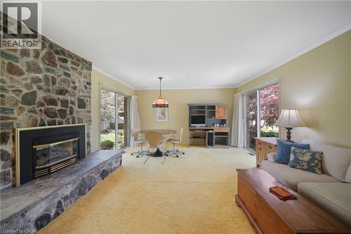 133 Mccall Crescent, Simcoe, ON - Indoor Photo Showing Living Room With Fireplace