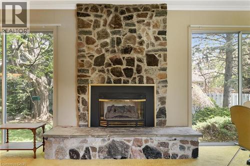 133 Mccall Crescent, Simcoe, ON - Indoor Photo Showing Living Room With Fireplace