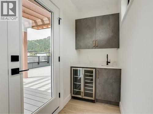 Top floor wet bar off the rooftop balcony - 910 Lakeside Drive Unit# 208, Nelson, BC - Indoor Photo Showing Other Room