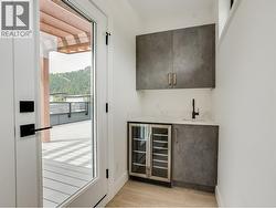 Top floor wet bar off the rooftop balcony - 