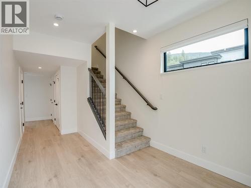 Stairs to main level - 910 Lakeside Drive Unit# 208, Nelson, BC - Indoor Photo Showing Other Room