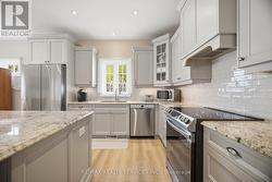 Quartz counters, stainless steel appliances - 