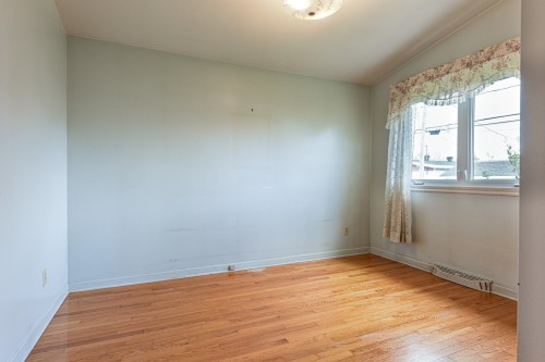 Chambre à coucher principale - 5870 Rue Arthur, Brossard, QC - Indoor Photo Showing Other Room