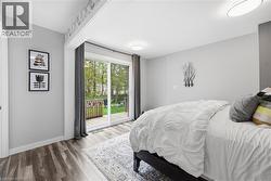 Sliding glass doors opening to an exterior wood deck - 