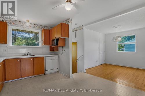 Kitchen looks out on back yard. - 3295 Highway 34 Highway, Champlain, ON 