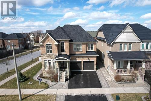 48 HERON HOLLOW AVENUE  Richmond Hill, ON L4E 0G9