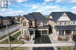 48 HERON HOLLOW AVENUE Richmond Hill, ON L4E 0G9
