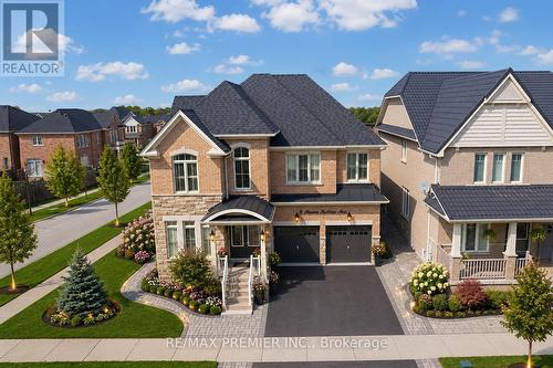 48 HERON HOLLOW AVENUE  Richmond Hill, ON L4E 0G9