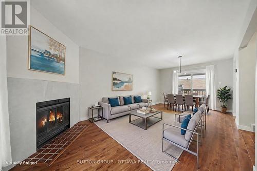 73 Scrivens Street, Ottawa, ON - Indoor Photo Showing Living Room With Fireplace