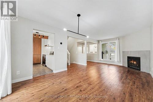 73 Scrivens Street, Ottawa, ON - Indoor Photo Showing Living Room With Fireplace