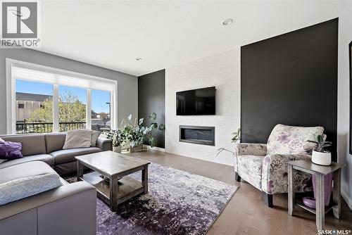 3930 Sandhill Crescent, Regina, SK - Indoor Photo Showing Living Room With Fireplace