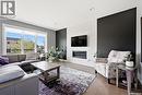 3930 Sandhill Crescent, Regina, SK  - Indoor Photo Showing Living Room With Fireplace 