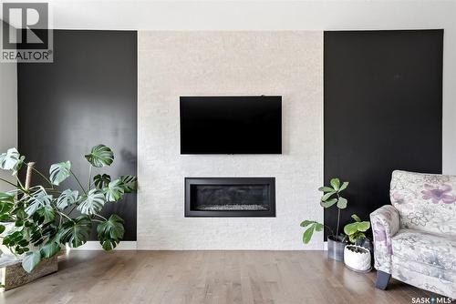 3930 Sandhill Crescent, Regina, SK - Indoor Photo Showing Living Room With Fireplace