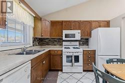 Eat in kitchen with gas stove & updated backsplash - 