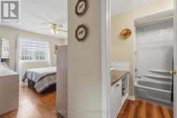 Main floor bedroom with 4pc ensuite - 