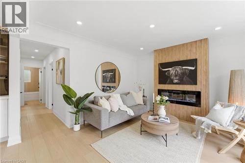 374 East 13Th Street, Hamilton, ON - Indoor Photo Showing Living Room With Fireplace