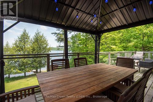 Screened in out door dining - 294 Everett Drive, Parry Sound Remote Area (Restoule), ON - Outdoor With Deck Patio Veranda With Exterior