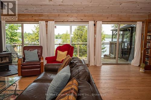 Patio doors to access front deck - 294 Everett Drive, Parry Sound Remote Area (Restoule), ON - Indoor Photo Showing Living Room