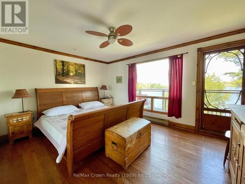 2nd Floor - Bedroom #2 with w/o to balcony - 294 Everett Drive, Parry Sound Remote Area (Restoule), ON - Indoor Photo Showing Bedroom