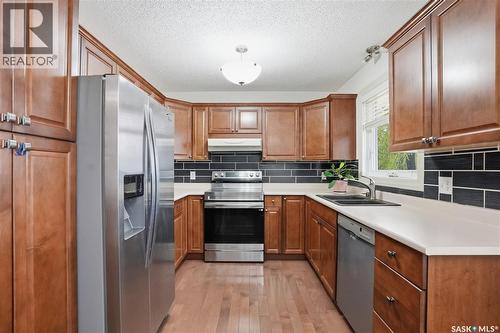 314 Waterbury Road E, Saskatoon, SK - Indoor Photo Showing Kitchen With Double Sink