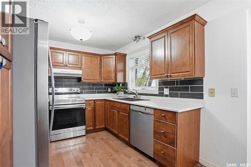 314 Waterbury Road E, Saskatoon, SK - Indoor Photo Showing Kitchen With Double Sink
