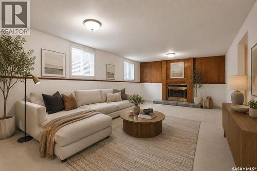 314 Waterbury Road E, Saskatoon, SK - Indoor Photo Showing Living Room With Fireplace