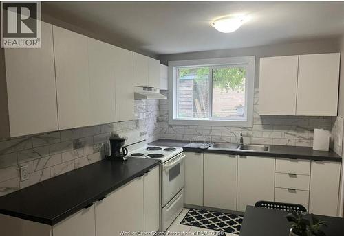 701 Marentette Unit# A, Windsor, ON - Indoor Photo Showing Kitchen With Double Sink