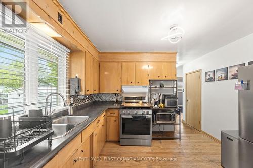 58 Centre Crescent N, London South (South D), ON - Indoor Photo Showing Kitchen With Double Sink