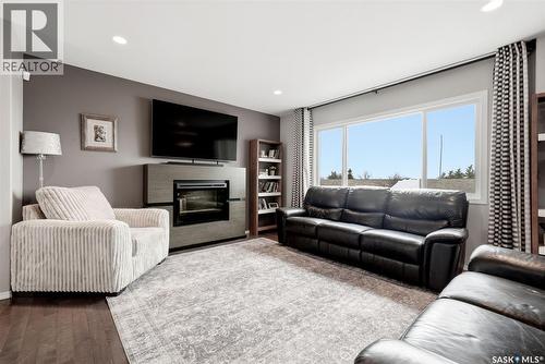 5038 Anthony Way, Regina, SK - Indoor Photo Showing Living Room With Fireplace