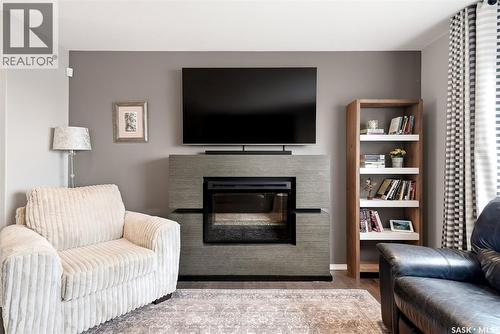 5038 Anthony Way, Regina, SK - Indoor Photo Showing Living Room With Fireplace