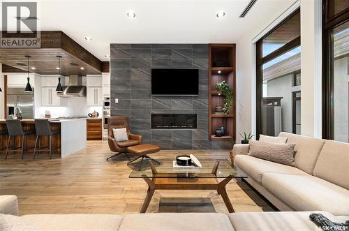 3430 Green Brook Road, Regina, SK - Indoor Photo Showing Living Room With Fireplace