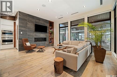3430 Green Brook Road, Regina, SK - Indoor Photo Showing Other Room With Fireplace