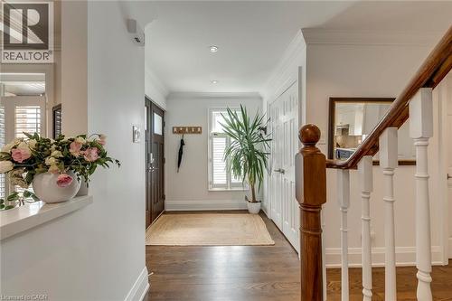 Foyer with crown molding and wood finished floors - 3311 Springvale Court, Burlington, ON - Indoor Photo Showing Other Room