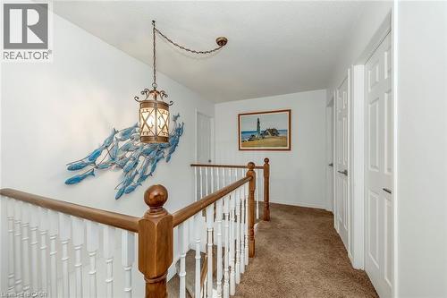 Hallway featuring an upstairs landing and carpet floors - 3311 Springvale Court, Burlington, ON - Indoor Photo Showing Other Room