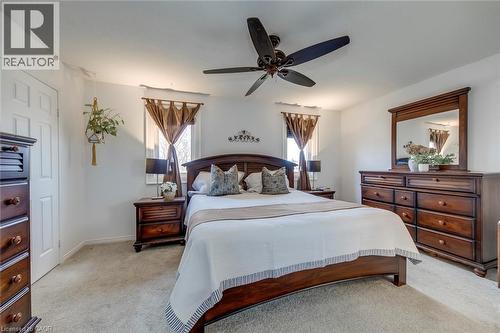 Bedroom featuring light colored carpet and ceiling fan - 3311 Springvale Court, Burlington, ON - Indoor Photo Showing Bedroom