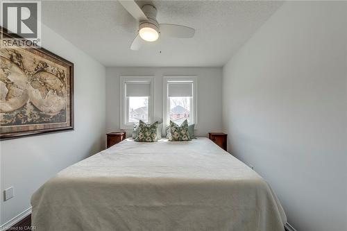 Bedroom featuring a textured ceiling and a ceiling fan - 3311 Springvale Court, Burlington, ON - Indoor Photo Showing Bedroom