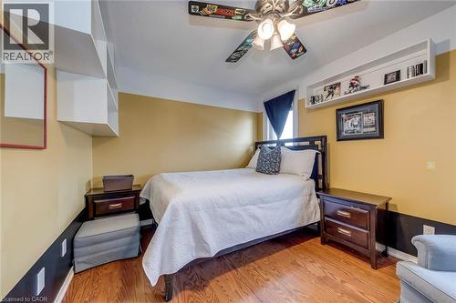 Bedroom with light wood-style flooring and a ceiling fan - 3311 Springvale Court, Burlington, ON - Indoor Photo Showing Bedroom