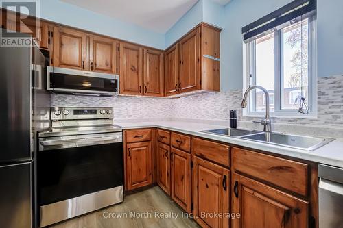 19 - 2 Paradise Boulevard, Ramara, ON - Indoor Photo Showing Kitchen With Double Sink