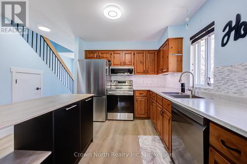 19 - 2 Paradise Boulevard, Ramara, ON - Indoor Photo Showing Kitchen With Double Sink