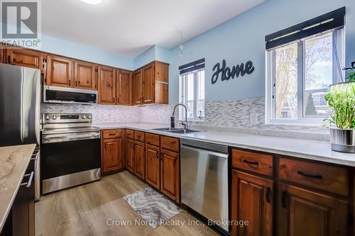 19 - 2 Paradise Boulevard, Ramara, ON - Indoor Photo Showing Kitchen With Double Sink