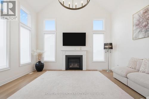22 Ewing Way, Amaranth, ON - Indoor Photo Showing Living Room With Fireplace