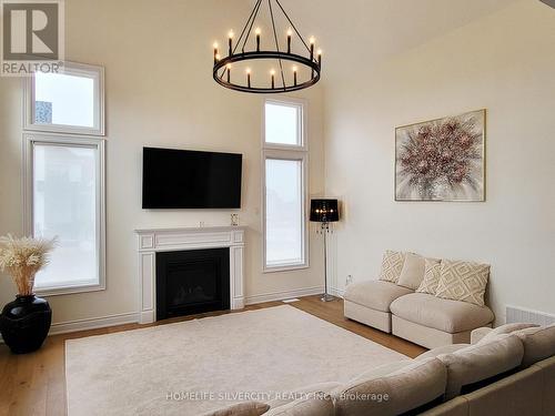 22 Ewing Way, Amaranth, ON - Indoor Photo Showing Living Room With Fireplace