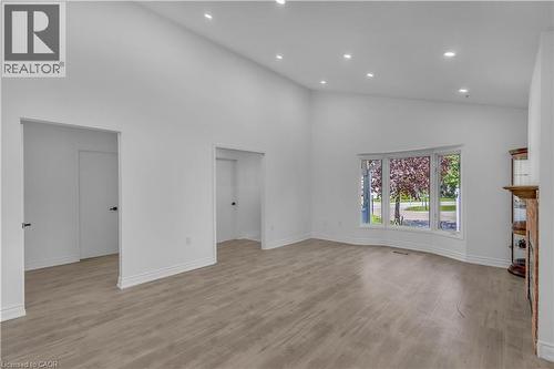 Expansive living area featuring vaulted ceilings and recessed lighting - 375 Silverbirch Boulevard, Hamilton, ON - Indoor Photo Showing Other Room