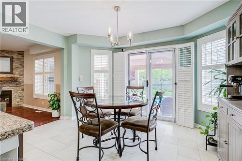 82 Vansickle Road, St. Catharines, ON - Indoor Photo Showing Dining Room With Fireplace