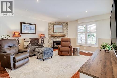 82 Vansickle Road, St. Catharines, ON - Indoor Photo Showing Living Room With Fireplace