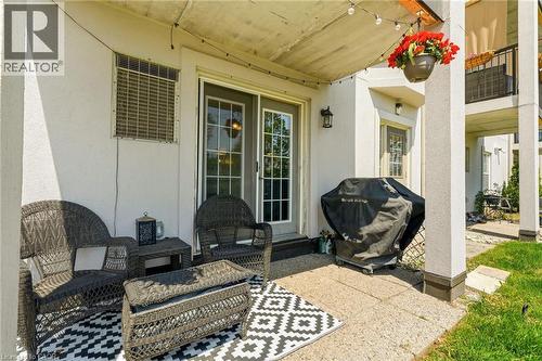 Outdoor patio with concrete flooring - 1411 Walker'S Line Unit# 105, Burlington, ON - Outdoor With Deck Patio Veranda