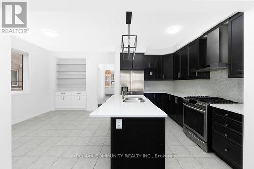 99 Cornwall Drive, Markham, ON - Indoor Photo Showing Kitchen With Double Sink