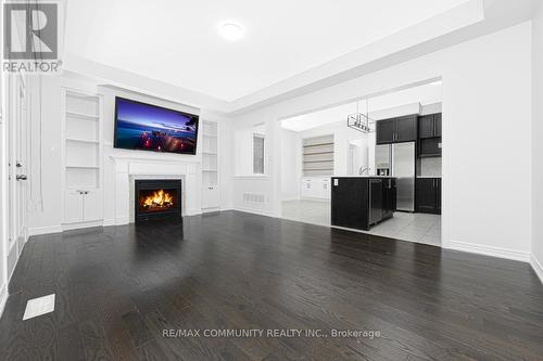99 Cornwall Drive, Markham, ON - Indoor Photo Showing Other Room With Fireplace