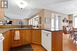 Kitchen looks over living rm, dining,rm, & water - 